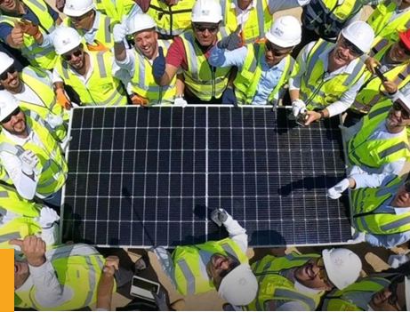 SME engineering team with a solar panel
